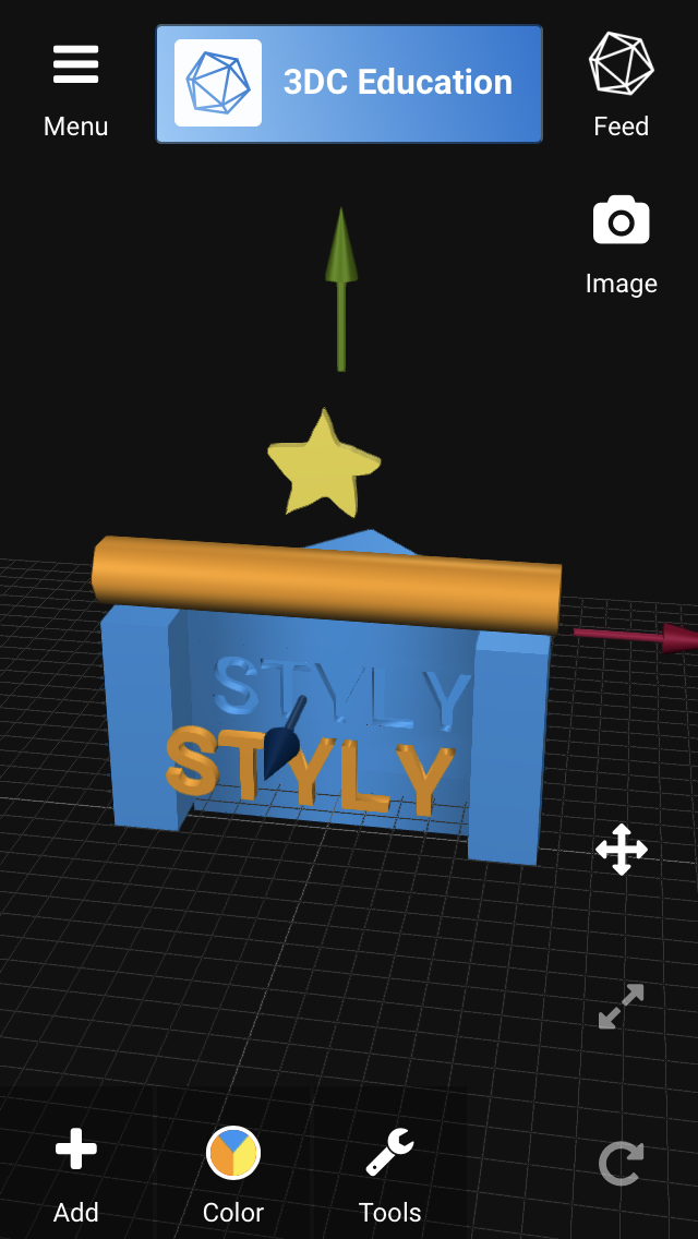 この場面では「STYLY」の3Dテキストで奥の三角柱のオブジェクトを削っている。
